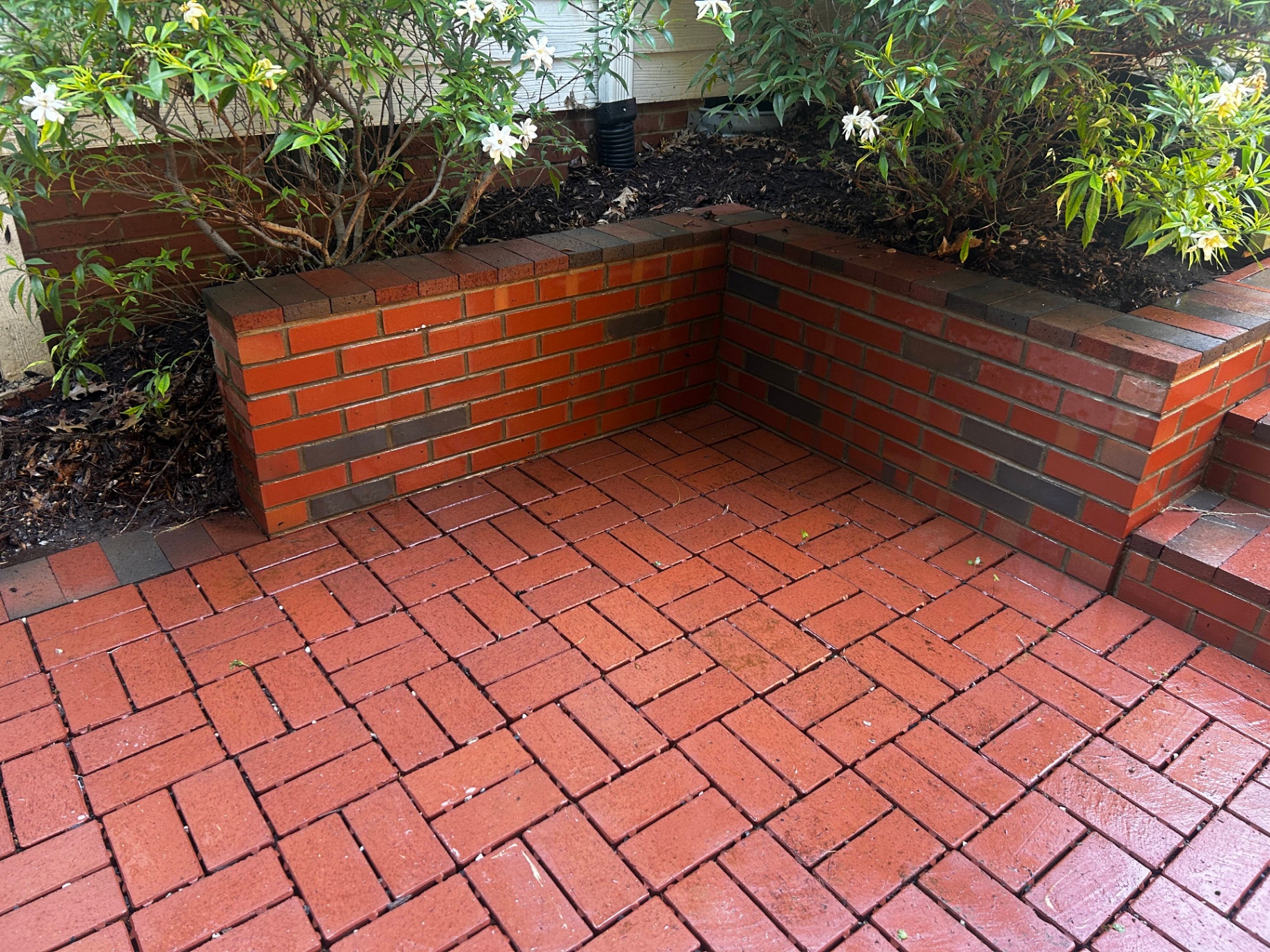 Freshly washed brick patio and retaining wall in Raleigh